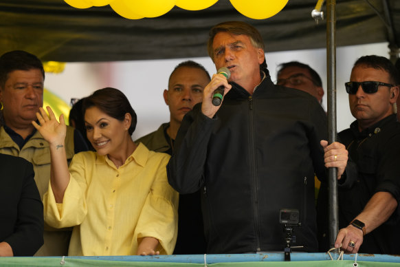 Brazilian President Jair Bolsonaro, with as his wife Michelle, formally launches his re-election campaign in Juiz de Fora, Minas Gerais state, on Tuesday.