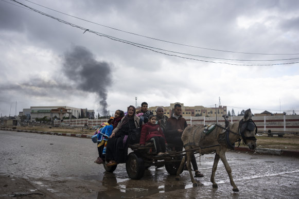 Palestinians flee from the city of Khan Younis in southern Gaza after an Israeli ground and air offensive in late January.