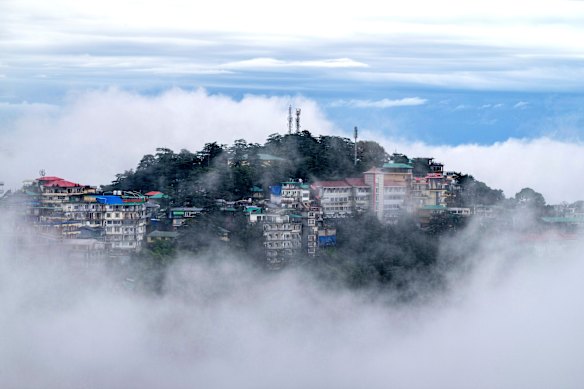 Clouds surround the Himalayan township of McLeodganj in Dharamshala, India.