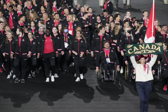 Canadian athletes enter the stadium during the Commonwealth Games opening ceremony.