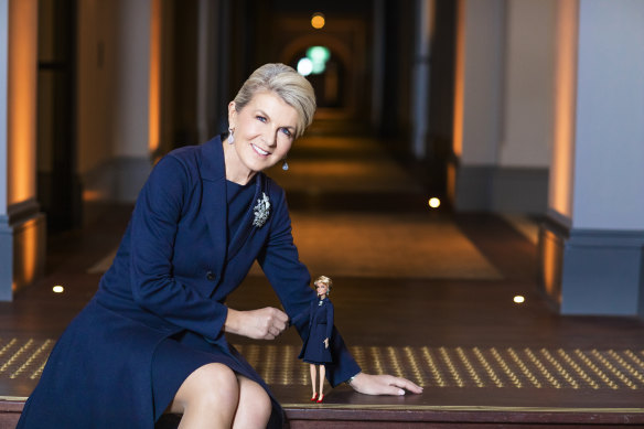 Julie Bishop with her Barbie doll, whose outfit is modelled on her dress from the day she quit politics.