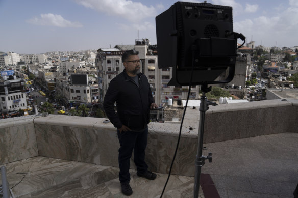 An Al Jazeera reporter speaking live from the network’s office in the West Bank city of Ramallah on Sunday. 