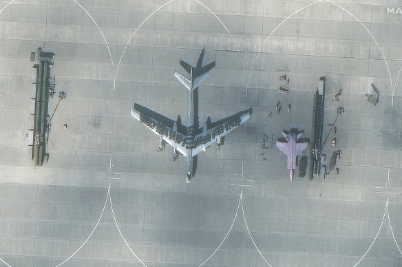 A satellite image from Maxar Technologies shows the curious arrangement at the Russian air base. 