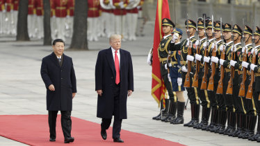 Donald Trump with Xi Jinping in Beijing in November.