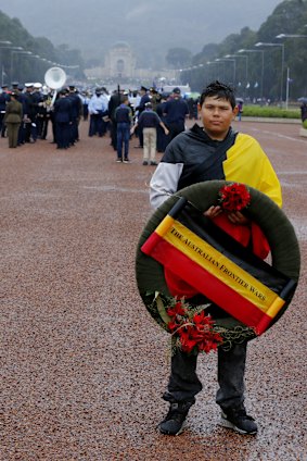 Thirteen-year-old Wiradjuri-Brinja Yuin boy Jai Russell waiting to lead the Frontier Wars contingent for the ANZAC Day march at the Australian War Memorial in Canberra, April 2017.  