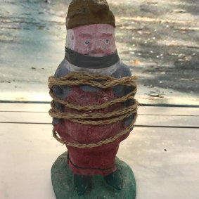 The bound and gagged gnome.