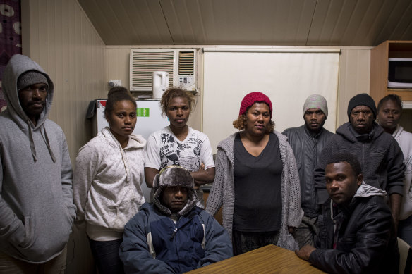 Tulia Roqara, centre, at a meeting in her caravan with other workers from Vanuatu.