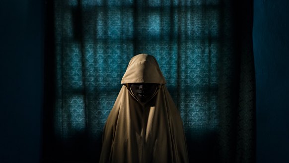 Aisha, 15, was kidnapped by Boko Haram and subsequently refused to carry out a suicide bombing, in Maiduguri, Nigeria, last year. 