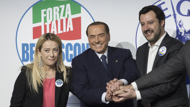 Giorgia Meloni, leader of the far-right Brothers of Italy party, Silvio Berlusconi and Matteo Salvini, leader of the Northern League, at a rally in Rome.