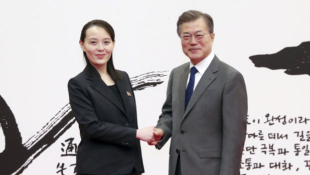 South Korean President Moon Jae-in, right, poses with Kim Yo -jong, Kim Jong Un's sister during the Olympics.