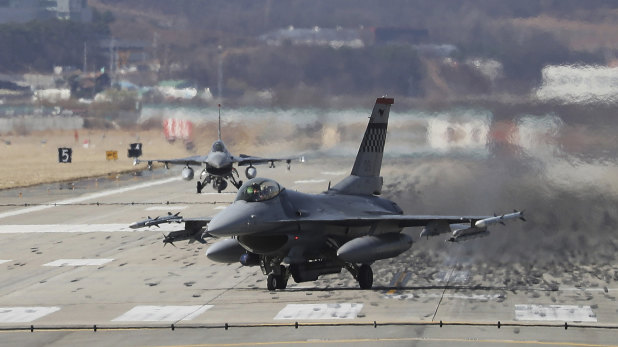 US Air Force F-16 fighter jets land at the Osan US Air Base in Pyeongtaek, South Korea, on Tuesday, March 20.