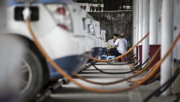 Electric taxis recharging in China.