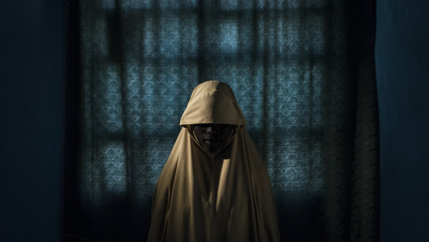 Aisha, 15, was kidnapped by Boko Haram and subsequently refused to carry out a suicide bombing, in Maiduguri, Nigeria, last year. 