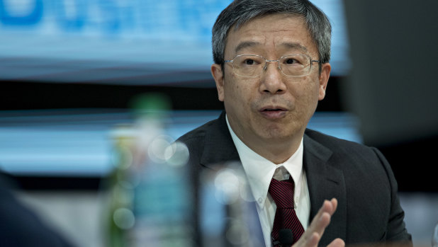 Yi Gang, a US-educated economist, is a protégé and deputy of Zhou.