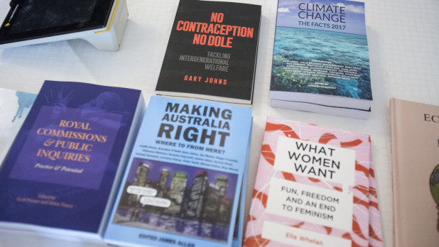 Reading material for sale at Senator Malcolm Roberts' cost-of-living summit in Brisbane.