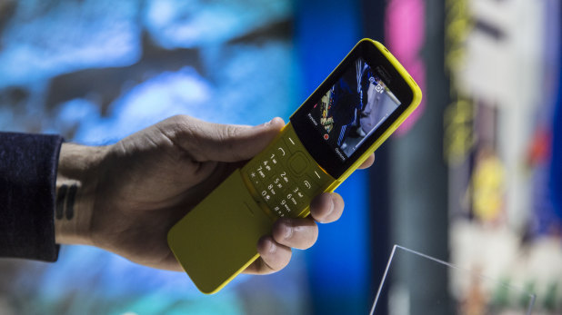 The new Nokia 8110, in yellow, which features 4G connectivity and a simple app store.