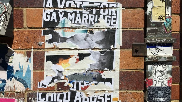Homophobic posters have appeared in West End, Brisbane ahead of the marriage postal vote.
