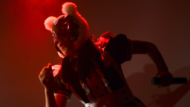 A member of Japanese pop group 'Virtual Currency Girls' performs in Tokyo.