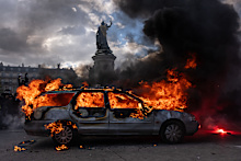 A car set ablaze in Paris.