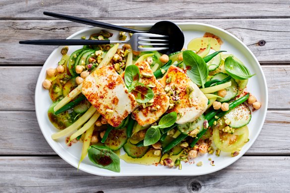 Opt for light meals like this freen bean and chickpea salad with crispy halloumi if eating late.