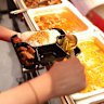 Load up a tray from the bain marie at Da Bao.