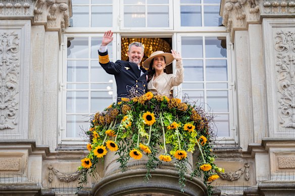 King Frederik X of Denmark and Queen Mary of Denmark on the balcony at Odense City Hall during their Summer Tour on June 1, 2026 in Odense, Denmark.
