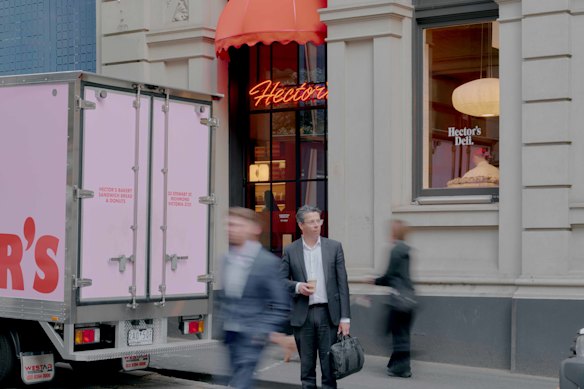 Outside Hector’s Deli’s sleek new site on Little Collins Street.