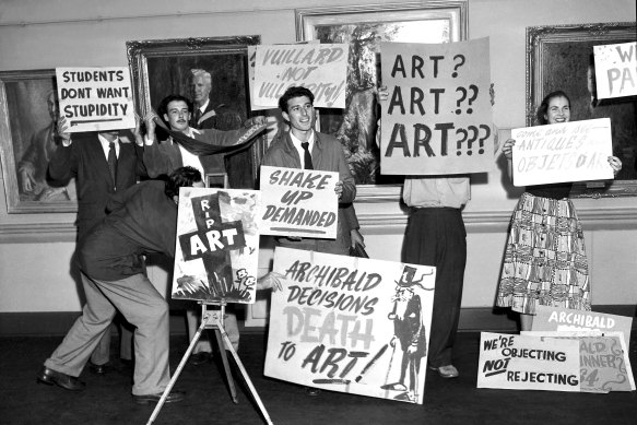 Art students at the Art Gallery of NSW, protest the awarding of the Archibald Prize to William Dargie for his portrait of Essington Lewis on January 24, 1953.