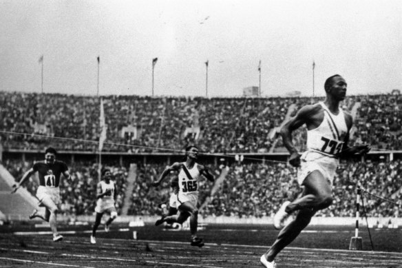 Jesse Owens breaking down social barriers at the 1936 Olympics.
