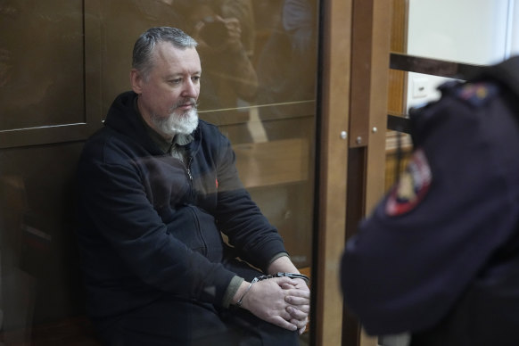 Igor Girkin, also known as Igor Strelkov, sits in a glass cage in the courtroom of the Moscow City Court.