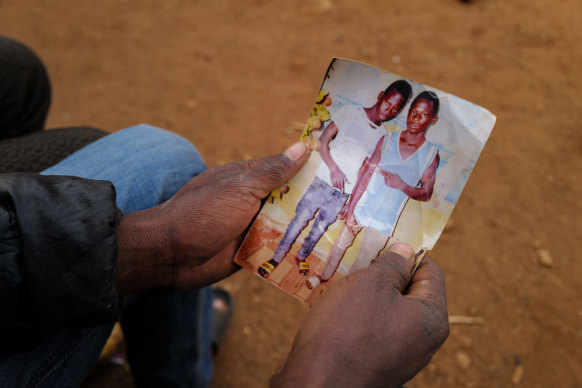 Gban villager Kwame Teng pictured with his brother who died inside the mine.