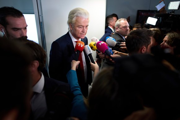 Far-right politician Geert Wilders talks to the media after pulling his party out of the four-party Dutch coalition.