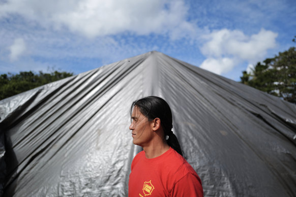 Cord Muñoz lost her surf shop when the fires consumed Maui this year.