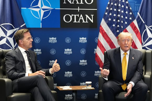 Trump speaks to reporters alongside NATO Secretary General Mark Rutte.