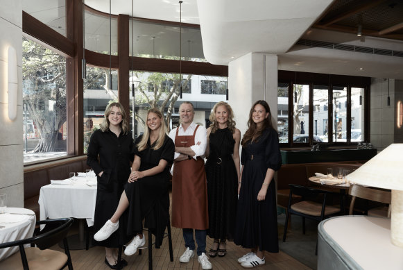 Perry with wife Samantha and, from left, daughters Josephine, Macy and Indy, who all work at Margaret.