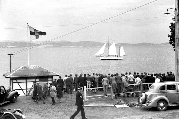 The Kathleen crosses the finish line in Hobart on 1 January 1946, at the completion of the first ever Sydney to Hobart Yacht Race. 