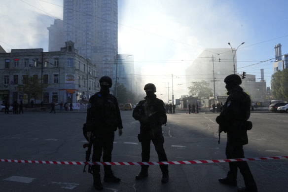 Police block a square after a drone fired on buildings in Kyiv on Monday.