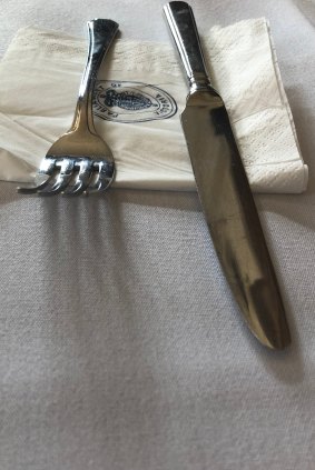 A butter knife and fork from Victorian Parliament's Strangers restaurant.