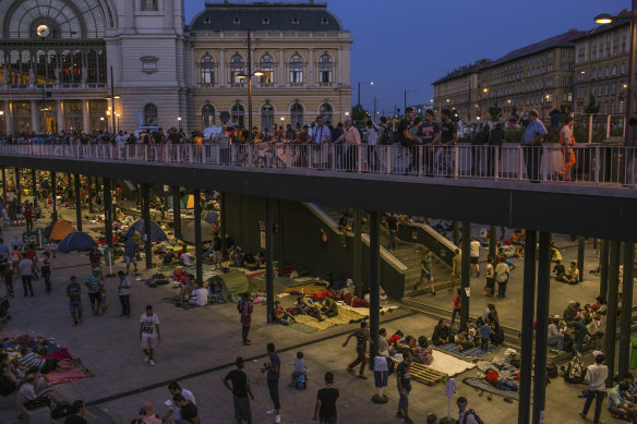 Syrian refugees camped out at Keleti station in 2015.  