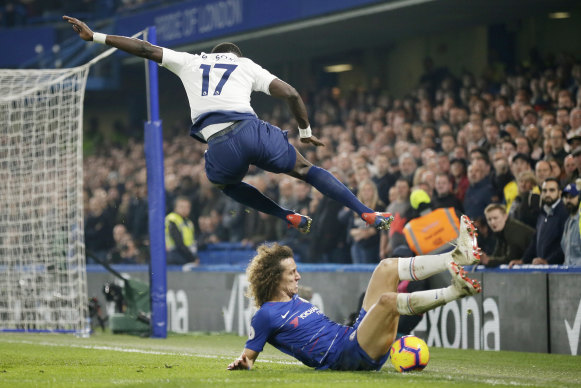 Tottenham's Moussa Sissoko (top) challenges Chelsea's David Luiz.