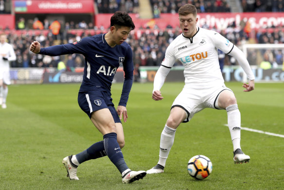 Grounded: A Swansea semi-final berth was thwarted by Tottenham.
