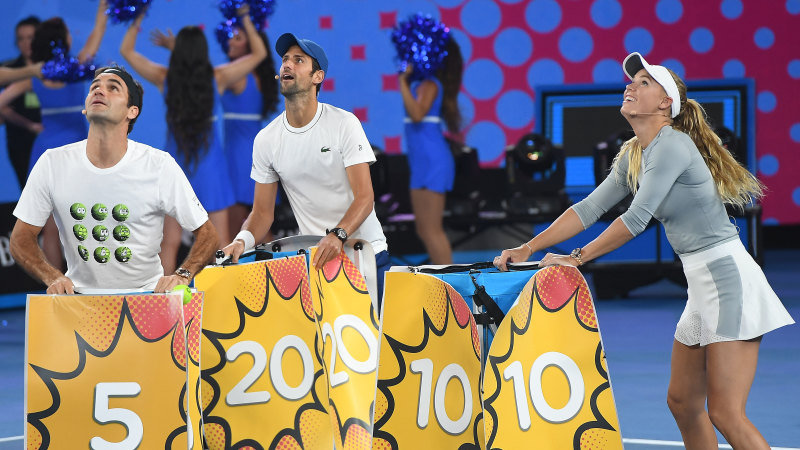 Roger Federer and family-friendly entourage join thousands at Australian Open 'Kids Tennis ...