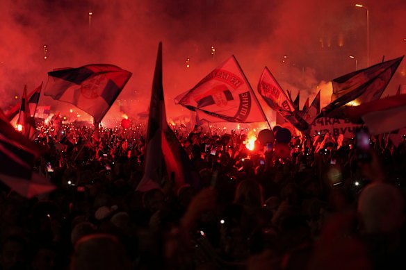 Supporters of Serbia’s President Aleksandar Vucic gather during a rally, apparently designed to counter student-led gatherings, in Belgrade, Serbia.