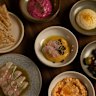 Meze plates include taramosalata dip, green chilli kingfish and tirokafteri.