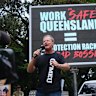 Former Queensland state secretary Michael Ravbar speaks to protesters outside state parliament in February 2024.
