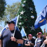 Unions representing garbage truck drivers and other field workers marched through the Ipswich CBD while on strike over stalled pay deal negotiations with the council on Friday.