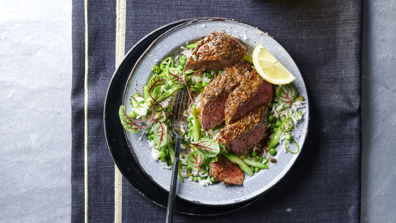 Jerk-spiced lamb with pickle rice salad and peas