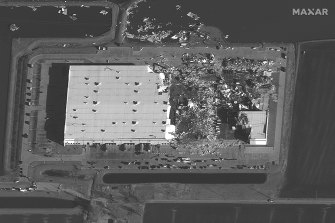 This satellite photo provided by Maxar shows a close-up of an Amazon warehouse in Edwardsville, Ill., after severe storms moved through the area late the previous evening, causing catastrophic damage.