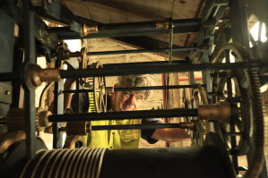 Andrew Markerink installing the refurbished workings of the Hyde Park barracks clock.