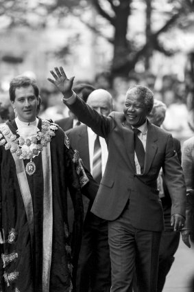 Mandela arrives at the Melbourne Town Hall in 1990.